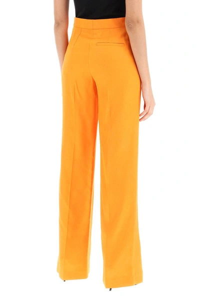 Shop Stella Mccartney Flared Tailoring Pants In Orange