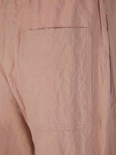 Shop Acne Studios Wide Cotton Pants In Rosa Envellit