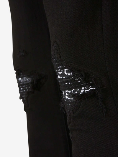 Shop Amiri Destroyed Cotton Jeans In Negre