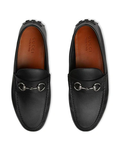 Shop Gucci Flat Shoes In Black