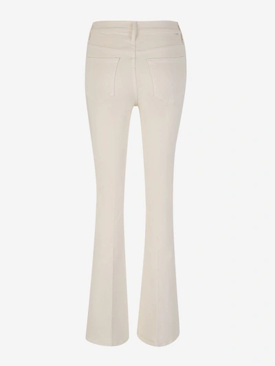 Shop Mother Cotton Flare Jeans In Beix