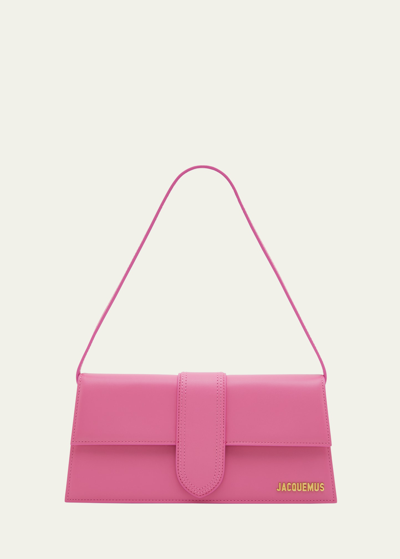 Shop Jacquemus Le Bambino Long Leather Shoulder Bag In Neon Pink