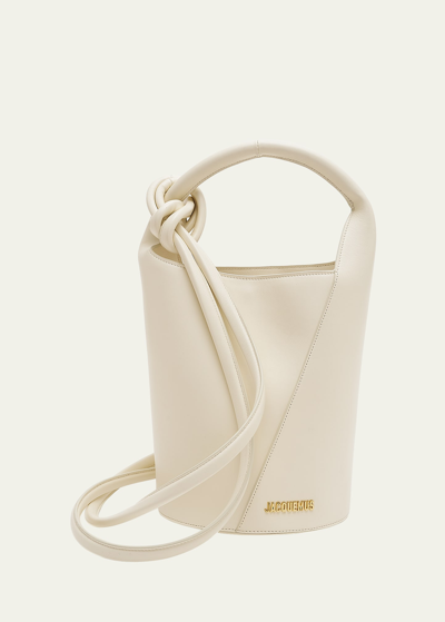 Shop Jacquemus Le Petit Tourni Leather Bucket Bag In Light Ivory