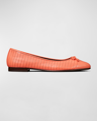 Shop Tory Burch Quilted Cap-toe Bow Ballerina Flats In Coral Crush