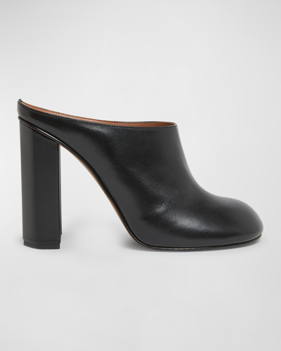 Shop Alaïa Leather Block-heel Mules In Black