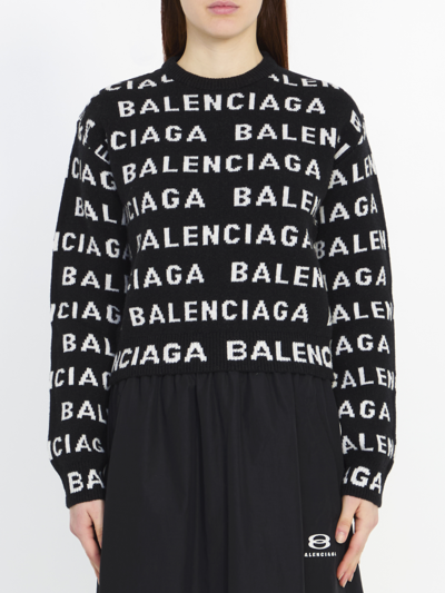 Shop Balenciaga Allover Logo Sweater In Black