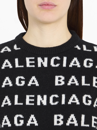 Shop Balenciaga Allover Logo Sweater In Black