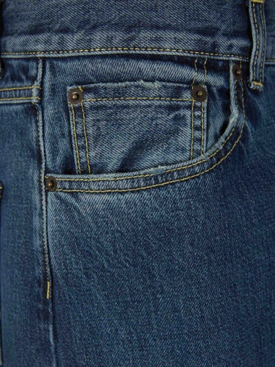 Shop Alexander Mcqueen Distressed Cotton Jeans In Blau Denim