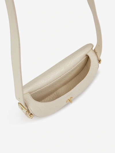 Shop Burberry Granulated Leather Bag In Ivori