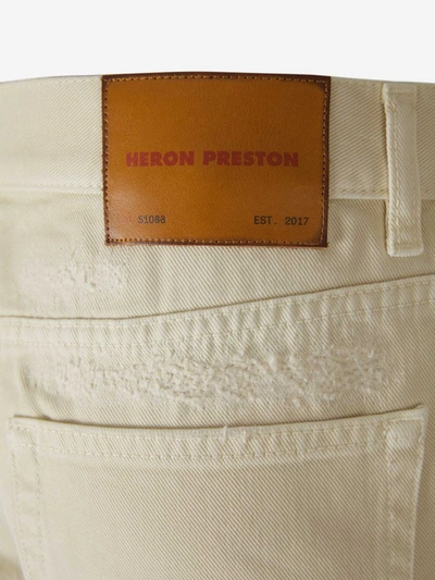 Shop Heron Preston Super Distressed Jeans In Ivori