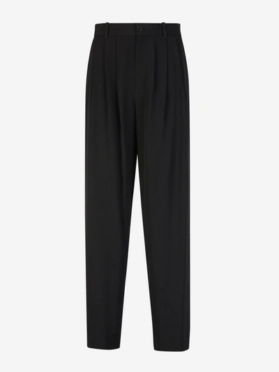Shop The Row Pleated Wool Pants In Negre