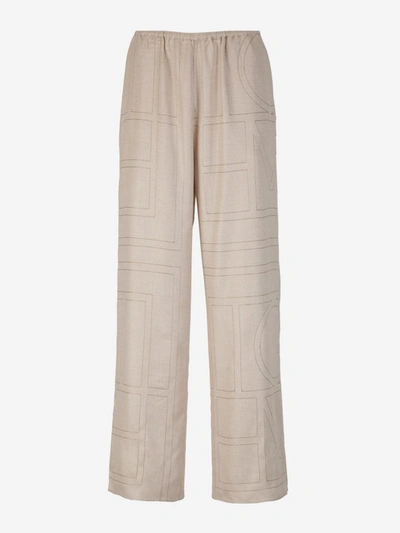 Shop Totême Monogram Stitching Joggers In Crema