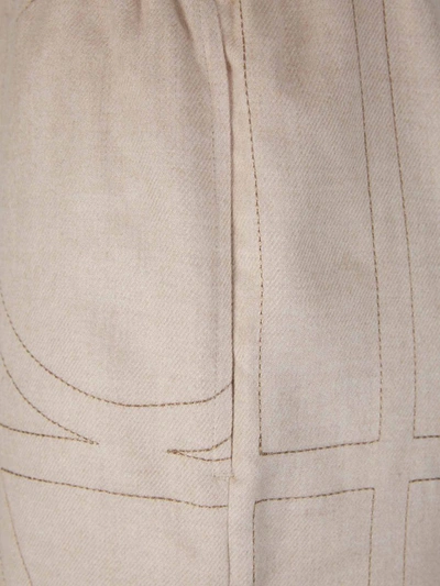 Shop Totême Monogram Stitching Joggers In Crema