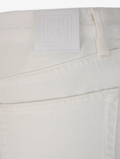 Shop Totême Straight Cotton Jeans In Blanc