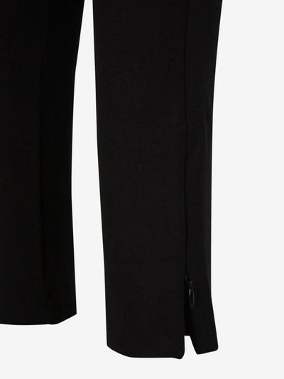 Shop Totême Elastic Zipper Leggings In Negre