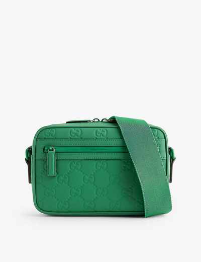 Shop Gucci Newsham Debossed-branding Large Leather Cross-body Bag