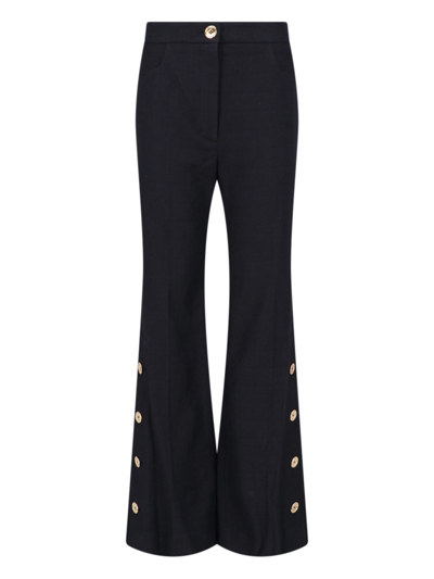 Shop Patou Gold Button Trousers In Black  