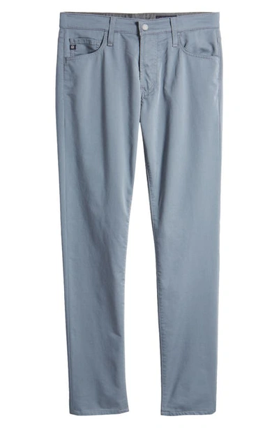 Shop Ag Tellis Airluxe™ Commuter Performance Sateen Pants In Blue Ice