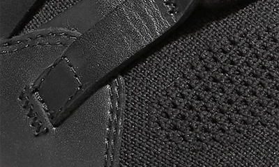 Shop Cole Haan Grand Motion Stitchlite™ Ii Sneaker In Black/ British Tan/ Ivory