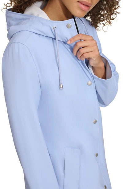 Shop Levi's Water Resistant Hooded Long Rain Jacket In Brunnera Blue