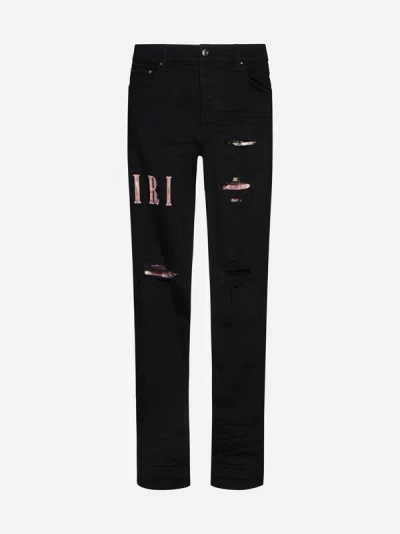 Shop Amiri Tie-dye Logo Skinny Jeans In Black