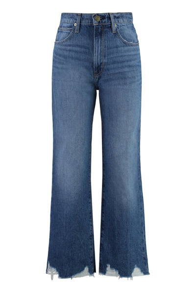 Shop Frame The Relaxed Frayed Hem Jeans In Blue