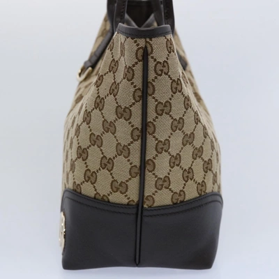 Shop Gucci Beige Canvas Shoulder Bag ()