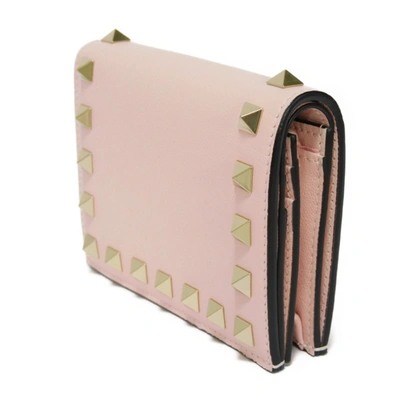 Shop Valentino Garavani Rockstud Pink Pony-style Calfskin Wallet  ()