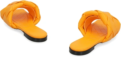 Shop Bottega Veneta Lido Leather Flat Sandals In Orange