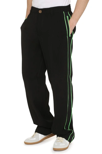 Shop Versace Logoed Side Stripes Track-pants In Black
