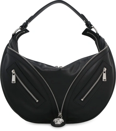 Shop Versace Repeat Hobo Bag In Black