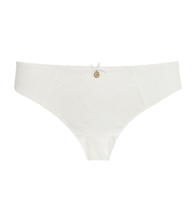 Shop Chantelle Lace Orchids Thong In Ivory