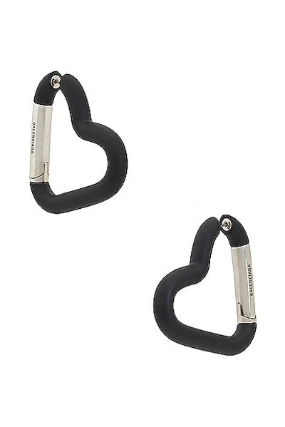 Shop Balenciaga Love Clip Earrings In Matte Black & Antique Silver
