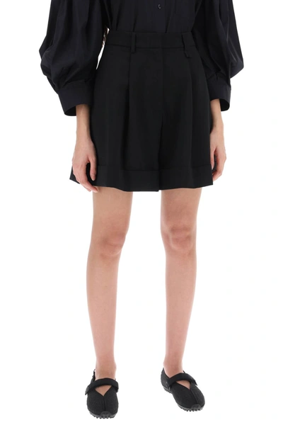 Shop Simone Rocha Flared Shorts With Cuffed Hem