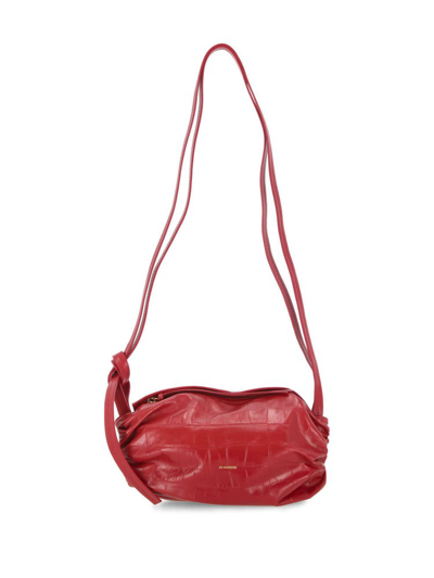Shop Jil Sander Embossed Small Cushion Shoulder Bag In Red