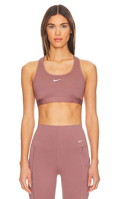Shop Nike Swoosh Medium Support Sports Bra In Smokey Mauve & White