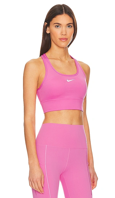 Shop Nike Padded Longline Sports Bra In Playful Pink & White