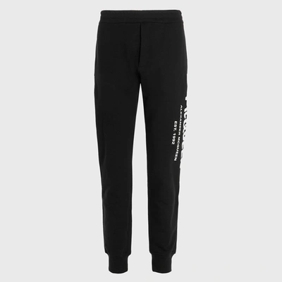 Shop Alexander Mcqueen Black And White Cotton Track Pants In Black/ivory