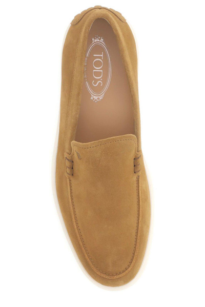 Shop Tod's Logo Embossed Slip-on Loafers In Multicolor