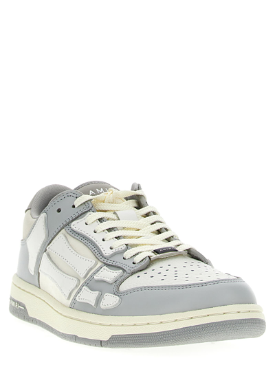 Shop Amiri Skel Top Low Sneakers In Gray