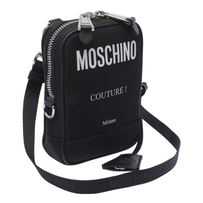 Shop Moschino Couture Messenger Bag In Black