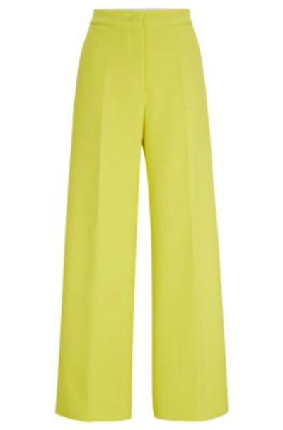 Shop Hugo Boss Wide-leg Trousers In A Cotton Blend In Yellow