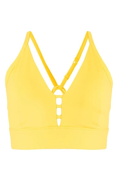 Shop Sweaty Betty Super Soft Strappy Back Sports Bra In Cheerful Yellow