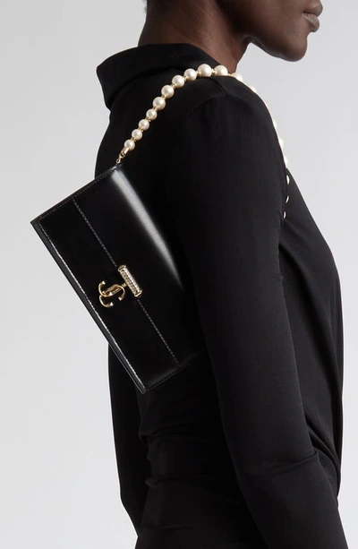 Shop Jimmy Choo Avenue Leather Shoulder Bag In Black/ Light Gold