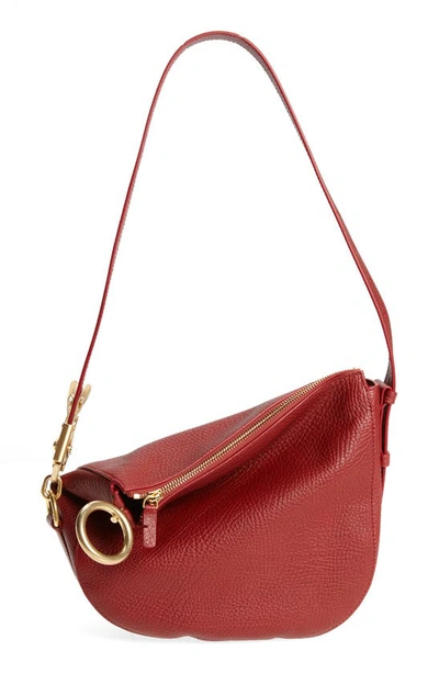 Shop Burberry Small Knight Asymmetric Leather Shoulder Bag In Ruby