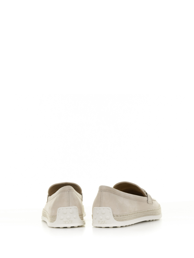 Shop Tod's Suede Moccasin With T Ring Accessory In Beige