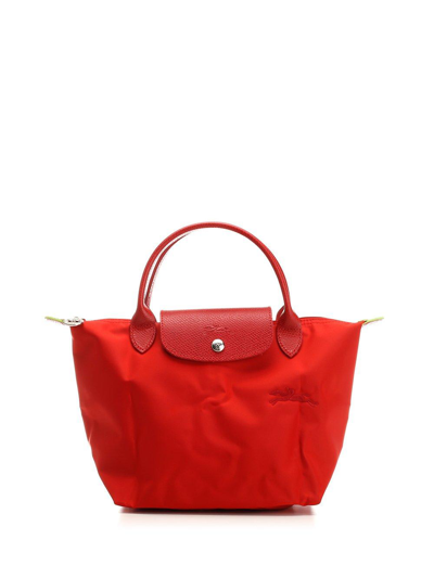 Shop Longchamp Le Pliage Small Top Handle Bag In Red