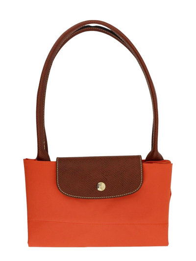 Shop Longchamp Le Pliage Large Top Handle Bag In Orange