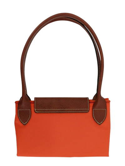 Shop Longchamp Le Pliage Large Top Handle Bag In Orange