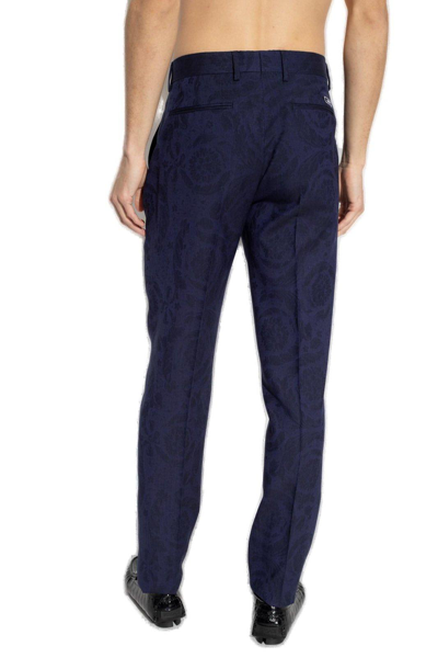 Shop Versace Pleated Tailored Trousers In Blue